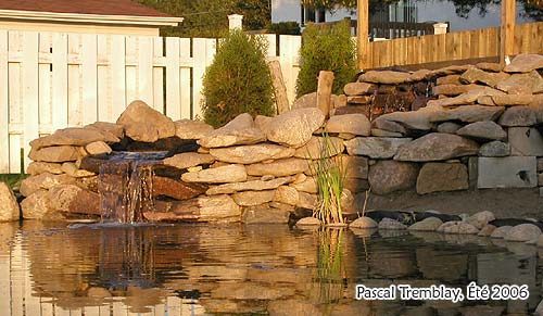 Création d'un bassin hors sol avec cascade en lames de résine minérale sur  la commune de Gradignan en région bordelaise - VOG Concepteur de terrasse  bois - VOG Concepteur de terrasse bois